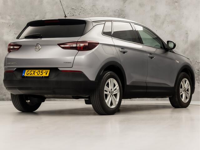 Opel Grandland X 1.2 Turbo Sport (APPLE CARPLAY, NAVIGATIE, GETINT GLAS, CRUISE, SPORTSTOELEN, ARMSTEUN, LM VELGEN, NIEUWE APK, NIEUWSTAAT)