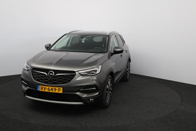 Opel Grandland X 1.2 Turbo Innovation/ D-Riem Verv 59.000KM!/ Trekhaak!/ Stoelventilatie!/ Stuur+Stoelverw!/ Camera/ Dodehoekdetectie/ Grootlichtass./ 19''LMV/ Elek.Stoel+Memory/ Clima/ Navi/ Cruise/ Multi.LEDER.Stuur/ Elek.pakket