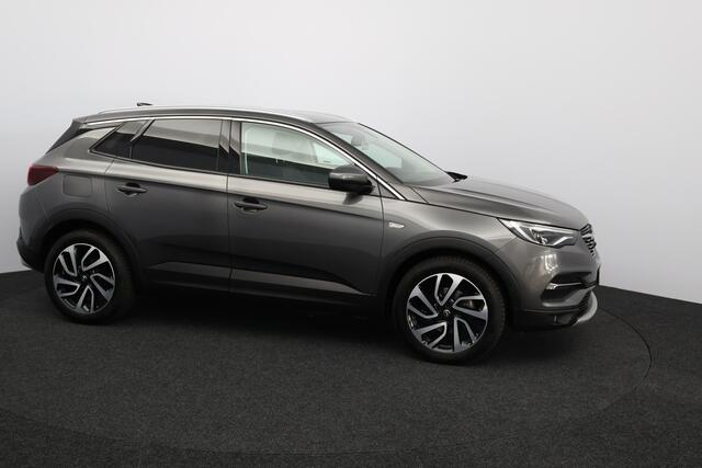 Opel Grandland X 1.2 Turbo Innovation/ D-Riem Verv 59.000KM!/ Trekhaak!/ Stoelventilatie!/ Stuur+Stoelverw!/ Camera/ Dodehoekdetectie/ Grootlichtass./ 19''LMV/ Elek.Stoel+Memory/ Clima/ Navi/ Cruise/ Multi.LEDER.Stuur/ Elek.pakket