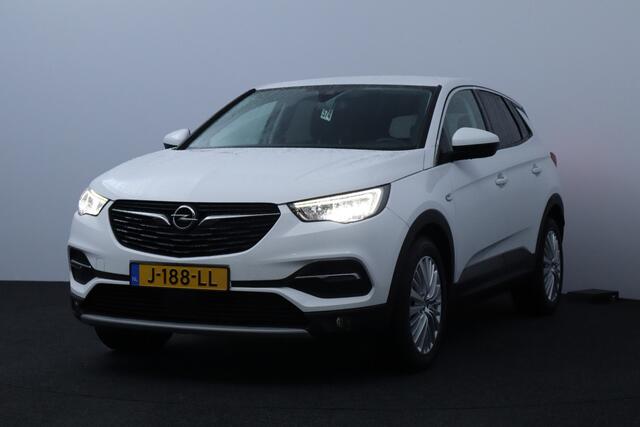 Opel Grandland X 1.2 Turbo Innovation/ D-RIEM VERV: 53.000 KM!/ Camera/ 18'' LMV/ Apple + Android/ Lane-Assist./ Dode-Hoek DET./ Clima/ Cruise/ Bluetooth/ Multi. LEDER. Stuur/ Mistl./ PDC V+A/ Extra getint glas.
