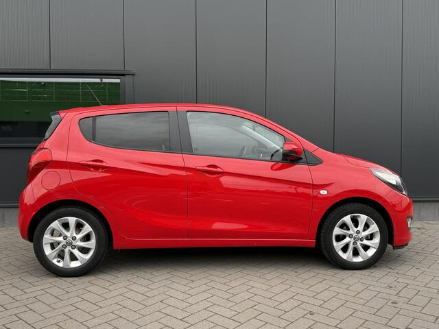 Opel KARL 1.0 ecoFLEX Cosmo 75 PK | 1 jaar garantie | NAP | Origineel Nederlands | Lederen bekleding | Climate control | Cruise control | Parkeersensoren | Stuurverwarming | Stoelverwarming | Lichtmetalen velgen |