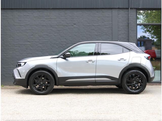 Opel MOKKA 1.2 136PK Turbo Hybrid GS | AppleCarPlay/AndroidAuto | Alcantara/Leer | Cruise Control | Climate Control | Camera | Digitale Cockpit | Navigatie | FULL LED | Privacy Glass | TwoTone | Massage Bestuurdersstoel |
