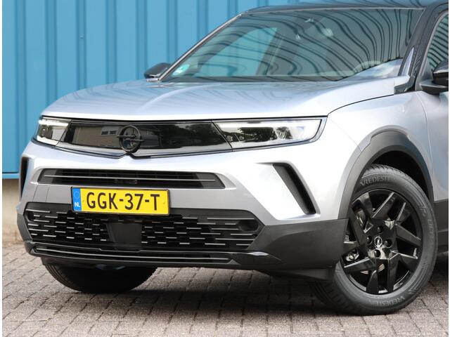 Opel MOKKA 1.2 Turbo Hybrid 136PK GS | AppleCarPlay/AndroidAuto | Alcantara/Leer | Cruise Control | Climate Control | Camera | Digitale Cockpit | Navigatie | FULL LED | Privacy Glass | TwoTone | Massage Bestuurdersstoel |