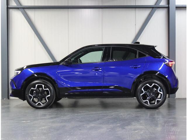 Opel MOKKA 1.2 145PK Hybrid GS | 1ste eigenaar | Alcantara | Stoel/Stuurverwarming | Massagestoel | FULL LED | Camera | Two-tone | Privacy Glass | AppleCarPlay/AndroidAuto | Navigatie | Adaptief Cruise Control | Keyless | Isofix |