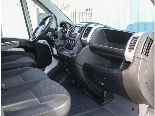 Opel MOVANO GB Zwaar Edition L3H2 2.2 165PK | Airco | Camera | Grip Control | Cruise Control | Armsteun | Trekhaak | 3 Zits | Houtenlaadvloer/Latbetimmering | Navigatie | Parkeersensoren | All Season Banden |