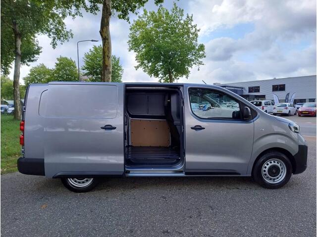 Opel VIVARO Electric L3 75 kWh 136pk | ACTIE! | 8 jaar garantie | Multimedia | Apple Carplay | Android Auto | Achteruitrijcamera | Parkeersensoren voor en achter | Digitale cockpit | Stuurwielbediening | Tussenwand comfort met raam | Bestuurdersstoel comfort | Bank v