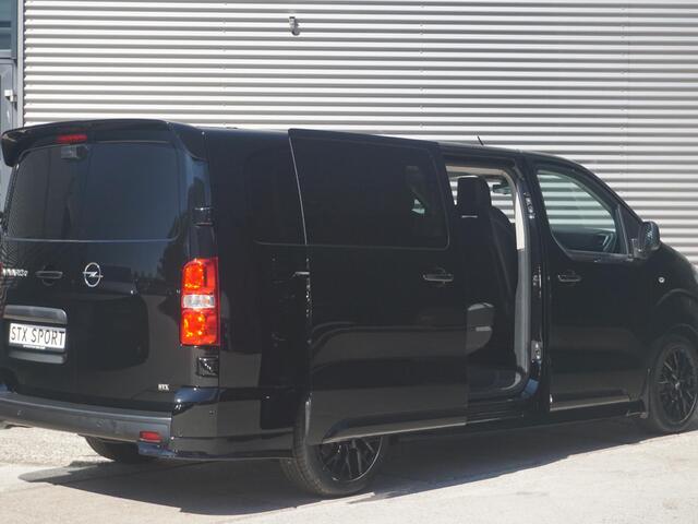 Opel VIVARO Vivaro-e Dubbele Cabine 75kWh | STX Sport | Mooiste bus van NL (!) | Lederen bekleding | Spoilerpakket | 18 inch Lichtmetalen velgen | Dynamic Comfort NAV Pakket | Winterpakket | 2x schuifdeur | Betimmering | Comfortstoelen |
