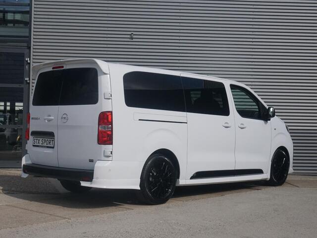 Opel VIVARO Vivaro-e Dubbele Cabine 75kWh | STX Sport | Mooiste bus van NL (!) | Lederen bekleding | Spoilerpakket | 18 inch Lichtmetalen velgen | Dynamic Comfort NAV Pakket | Winterpakket | 2x schuifdeur | Betimmering | Comfortstoelen |