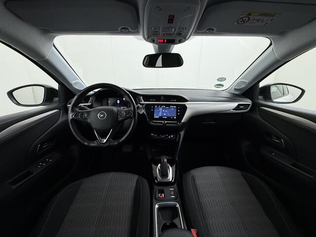 Opel e-Corsa Edition+ 50kWh Warmtepomp Fase 3 Laden Navi Stoel+Stuurverwarming 360°Camera Two-Tone Lak Ecc Navi Pack Parkeer Pack Pdc DAB Lmv 16" Privacy Glas Led Isofix Regen-Lichtsensor LaneAssist Origineel Nederlandse Auto SOH 89% Zeer compleet!