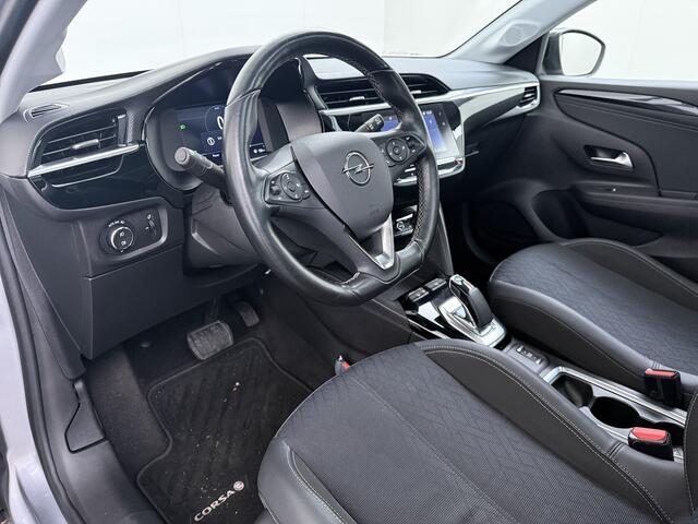 Opel e-Corsa Elegance 50kWh SOH 91% Panoramadak Adap.Cruise Warmtepomp 360°Camera Navi Ecc Apple Carplay Android Auto Pdc Lane Assist Lmv Privacy Glas Regen-Lichtsensor Led Keyless Zeer complete en keurig onderhouden Electrische Opel Corsa