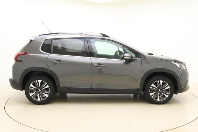 Peugeot 2008 1.2T 110pk Allure Peugeot 2008 1.2 PureTech Allure 110 Pk | Navigatie | Cruise Control | Climate Control | Panorama Dak | Lage Km-Stand | Electrische Ramen | LM-Velgen