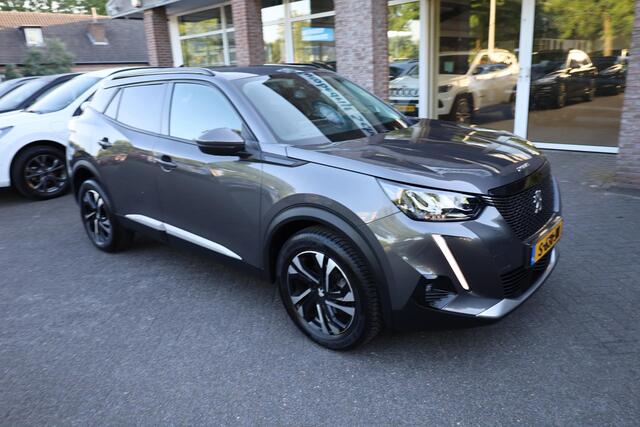 Peugeot 2008 1.2 PureTech Allure Pack CAMERA CRUISE CARPLAY DAB STOELVERW. HALF-LEDER 17"LMV ALL-SEASONS PDC