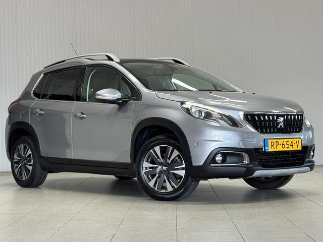 Peugeot 2008 1.2 PureTech Allure/ Panorama-Dak/ Trekhaak/ 16'' LMV/ Camera/ Apple + Andorid/ DAB+/ Half-Leder/ Navi/ Clima/ Cruise/ Bluetooth/ Multi. LEDER. Stuur/ Mistl./ PDC V+A/ Dakrails/ Chroom/ Extra getint glas.