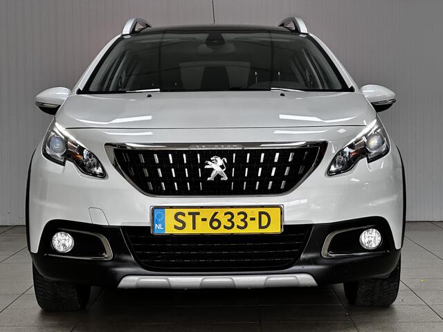 Peugeot 2008 1.2 PureTech Allure/ D-Riem verv: 99.000 KM!/ Panorama-Dak/ Half-Leder/ Extra getint glas/ Parelmoer Wit/ Camera/ Apple + Android/ DABG+/ Navi/ Clima/ Cruise/ Elek. pakket/ Bluetooth/ Multi. LEDER. Stuur/ Mistl.