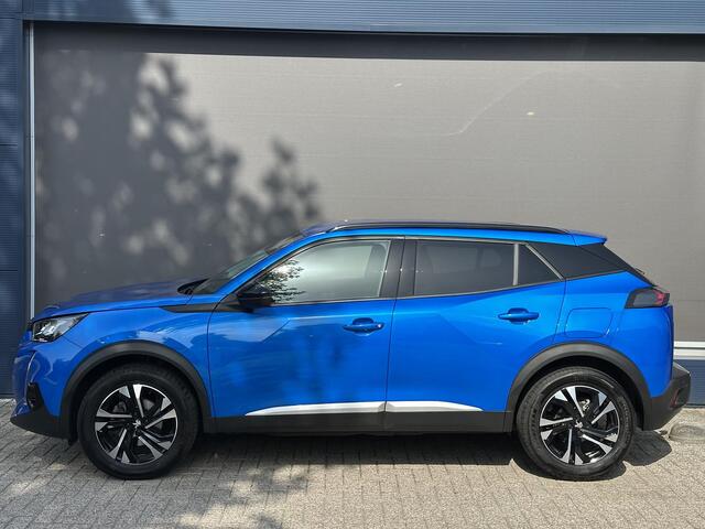 Peugeot 2008 1.2 Turbo 130 PK Allure Pack | Trekhaak 1200 KG | Navigatie | 3D Virtual Cockpit | Stoelverwarming | LED Verlichting | Half Lederen Bekleding | Keyless Start | Climate Control | Cruise Control | 17 Inch Lichtmetalen Velgen |