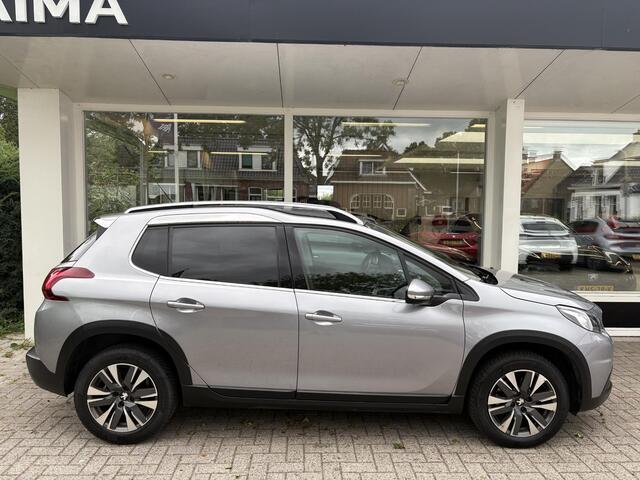 Peugeot 2008 1.2T 130pk Allure | Achteruitrijcamera | Climate Control | Nette staat | Apple Carplay/Android Auto | Privacy Glass | Half lederen bekleding | Navigatie