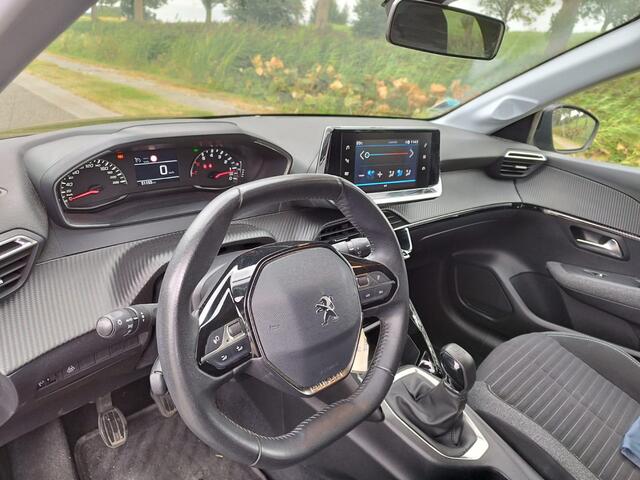 Peugeot 208 1.2 Style ** 5 DRS ** Airco ** Cruise ** LM velgen ** PDC ** NAVI APP **