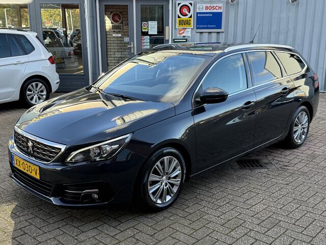 Peugeot 308 SW 1.2 PureTech Blue Lease Premium | TREKHAAK | LEER | CAMERA | NAVI | PANO |