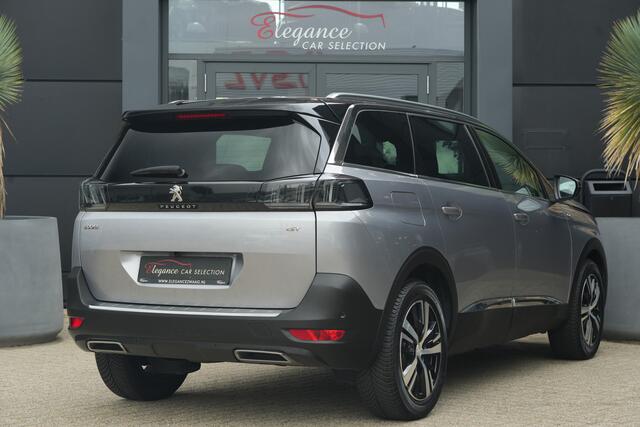 Peugeot 5008 1.2 PureTech GT | 131PK | 7-zits | Pano | Navigatie | Stoelverwarming | 360° camera Peugeot 5008 1.2 Puretech GT 131 PK met 1.2 viercilinder motor, panoramadak, 7-zits, stoelverwarming, 360° camera, navigatie, lichtmetalen velgen