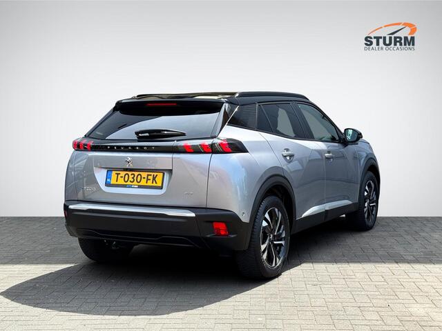 Peugeot e-2008 EV GT 50 kWh | Adapt. Cruise Control | Stoelverwarming | Dodehoek Detectie | Apple Carplay/Android Auto | Camera | Rijklaarprijs!