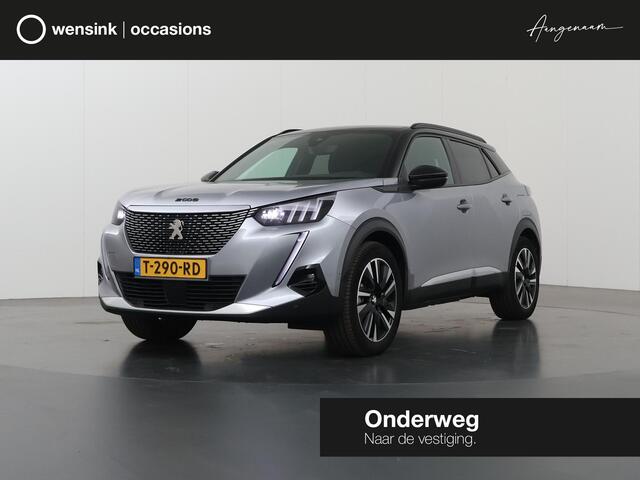 Peugeot e-2008 EV GT 50 kWh | Trekhaak | LED | Virtual Cockpit | Lederen Interieur | Navigatie | Camera | DAB | Apple CarPlay/Android Auto | 3-Fase | Stoelverwarming | Standkachel | Rijhulp Systeem | Panoramadak | Dodehoekdetectie |