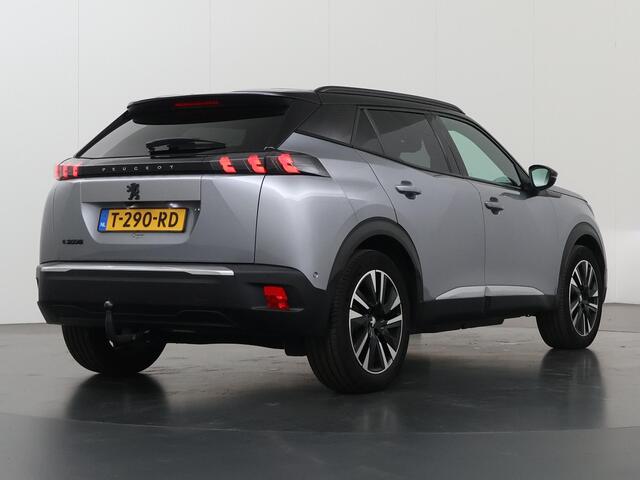 Peugeot e-2008 EV GT 50 kWh | Trekhaak | LED | Virtual Cockpit | Lederen Interieur | Navigatie | Camera | DAB | Apple CarPlay/Android Auto | 3-Fase | Stoelverwarming | Standkachel | Rijhulp Systeem | Panoramadak | Dodehoekdetectie |