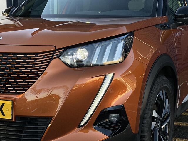 Peugeot e-2008 EV GT 50 kWh | Adaptive Cruise Control | Stoelverwarming | Panoramadak | Climate Control | Parkeercamera/-sensoren | Apple Carplay/Android Auto | Sfeerverlichting | Full LED | Keyless Entry/Start | Navigatie |