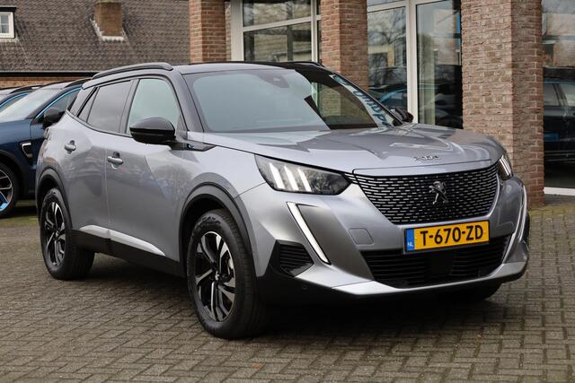 Peugeot e-2008 EV GT 50 kWh TREKHAAK-AFN PANO CARPLAY STOELVER. CRUISE 360-CAMERA HALF-LEER CRUISE CLIMA NAVI 2XPDC 17''LMV