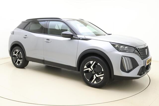 Peugeot e-2008 EV GT 54 kWh | Achteruitrijcamera | Parkeersensoren | Adaptive cruise control | Wireless charging | Navigatie | Airco | Climate control | Stuurbediening | Interieurverlichting | Half stof/leer bekleding | Verkeersbord detectie