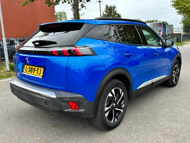 Peugeot e-2008 BWJ 2021 EV Allure 136 PK Pack 50 kWh FULL LED | HALF LEDER | ADAPTIVE CRUISE | CAMERA | KEYLESS | NAVI | CLIMA | CARPLAY + ANDROID | LMV | PDC