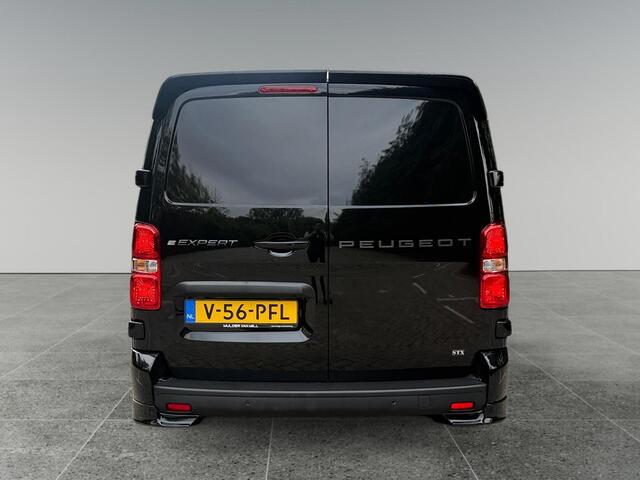 Peugeot e-Expert EV L3 75kWh 136pk STX SPORT | Lederen bekleding STX | STX Pakket | Dakspoiler | Sideskirts | 18 inch zwarte velgen | City NAVI Pakket | Comfort Pakket | Exterieur Pakket | Full ECO LED verlichting | Winter Pakket | Dubbele schuifdeur | Houten afwerking laadruimte | Scheidingswand comfort met raam | Reservewiel