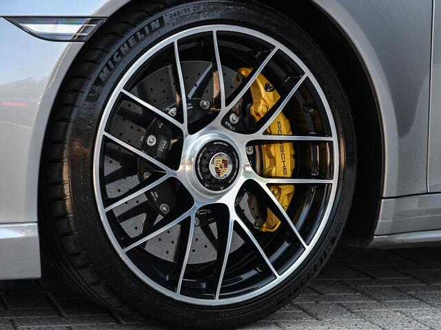 Porsche 911 Cabrio 3.8 Turbo S | Keramische Remmen | Carbon Inleg | 18 Wegs Adaptieve Sportstoelen + Memory | Achterasbesturing | Bose | Camera | Sport Chrono | Stoel + Stuurverwarming |