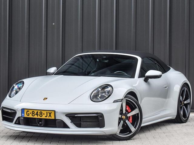 Porsche 911 Cabrio 3.0 Carrera 4 S NL-Auto 451pk | Sport design pack | Achteras besturing | Lift systeem | Sport chrono | 18-wegs memory seats | Burmester sound | Adaptive cruise | Carbon pack | Matrix led | 360 camera | Nw prijs 236.000