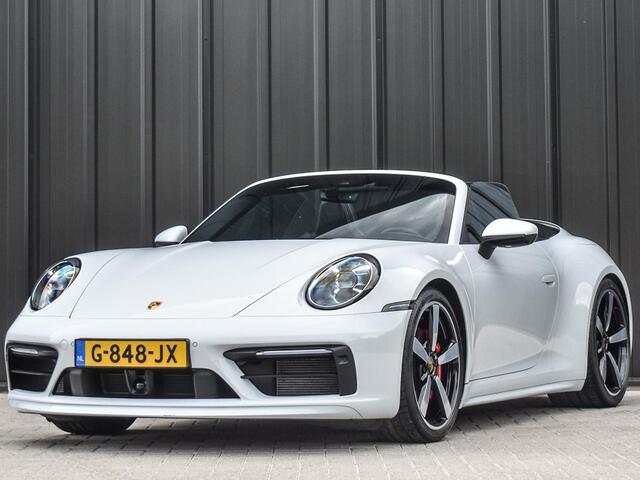 Porsche 911 Cabrio 3.0 Carrera 4 S NL-Auto 451pk | Sport design pack | Achteras besturing | Lift systeem | Sport chrono | 18-wegs memory seats | Burmester sound | Adaptive cruise | Carbon pack | Matrix led | 360 camera | Nw prijs 236.000