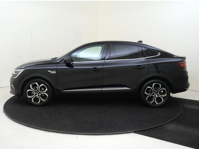 Renault Arkana 1.6 E-Tech Hybrid 145 PK | Apple Carplay/Android | cruise control adaptief | dodehoek detectie | electronic climate control | LED koplampen | lederen bekleding | lichtmetalen velgen 18" | navigatiesysteem | voorstoelen verwarmd |