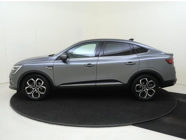 Renault Arkana 1.6 E-Tech Hybrid 145 Intens | Automaat | Stoelverwarming | Verwarmd Stuurwiel | Navigatie | Airco | Adaptieve Cruise Control | Parkeersensoren Voor + Achter | Parkeer Camera Achter