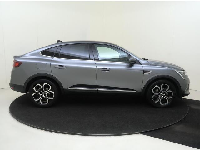 Renault Arkana 1.6 E-Tech Hybrid 145 Intens | Automaat | Stoelverwarming | Verwarmd Stuurwiel | Navigatie | Airco | Adaptieve Cruise Control | Parkeersensoren Voor + Achter | Parkeer Camera Achter
