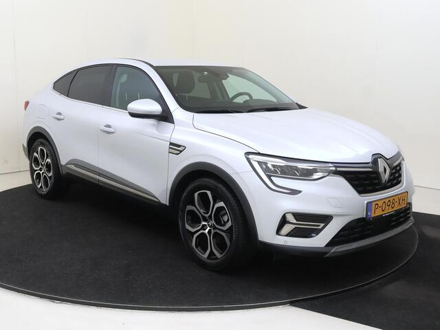 Renault Arkana 1.6 E-Tech Hybrid 145 Intens | Apple Carplay/Android Auto | Autonomous Emergency Braking | cruise control adaptief | dodehoek detectie | electronic climate control | lederen/stof bekleding | LED koplampen | lichtmetalen velgen 18" | navigatiesysteem |