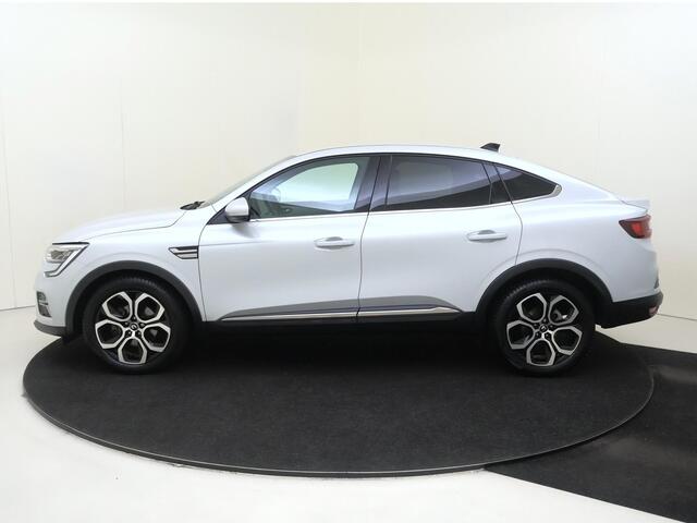 Renault Arkana 1.6 E-Tech Hybrid 145 Intens | Apple Carplay/Android | Autonomous Emergency Braking | cruise control adaptief | electronic climate control | lederen/stof bekleding | LED koplampen | lichtmetalen velgen 18" | navigatiesysteem |