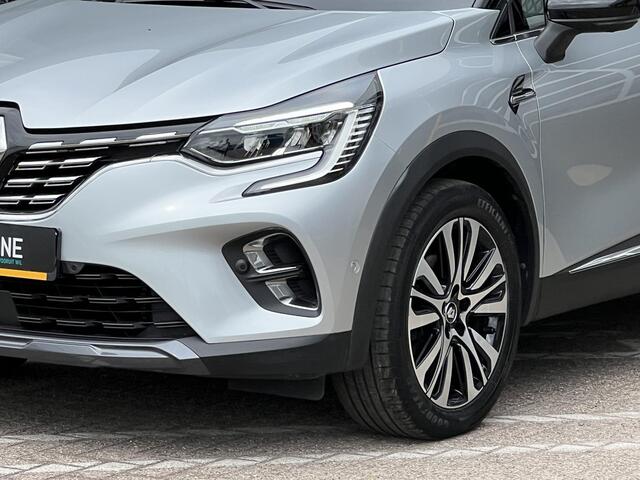 Renault CAPTUR 1.6 E-Tech Plug-in Hybrid 160 Initiale Paris | Glazen schuif-kantel dak | Bose Audio | 360 graden camera | Leer | Stoel & stuur verwarming | DAB | Navigatie | Clima |