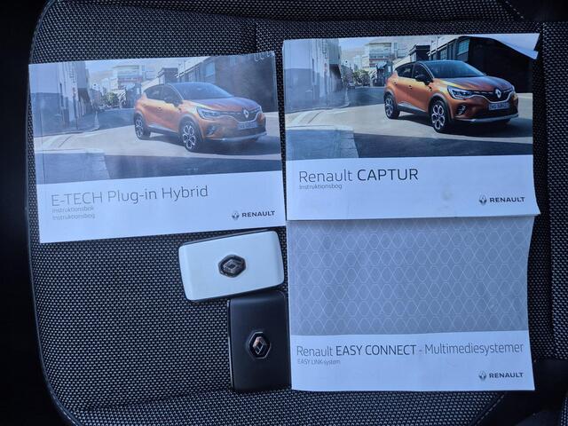 Renault CAPTUR 1.6 E-Tech Plug-in Hybrid 160 Intens Automaat / Pack parking / Pack Easy Link / Stuur en Stoel verwarming / Cruise control / Achteruitrijcamera / Keyless Entry/Start / Navigatie / Climate control / Draadloze telefoon lader /
