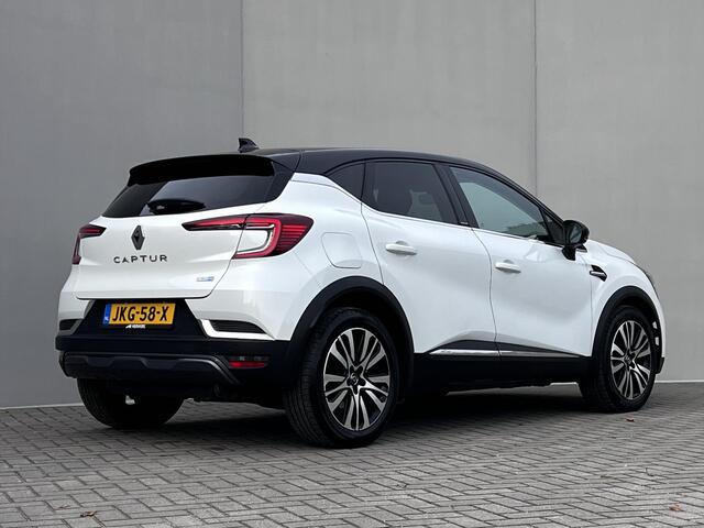 Renault CAPTUR E-TECH Plug-in 160 Hybrid Initiale Paris Automaat / Dealer onderhouden / Leder / Stuur- en stoelverwarming / Navigatie groot scherm / Apple Carplay Android / Camera / 18" LM wielen /