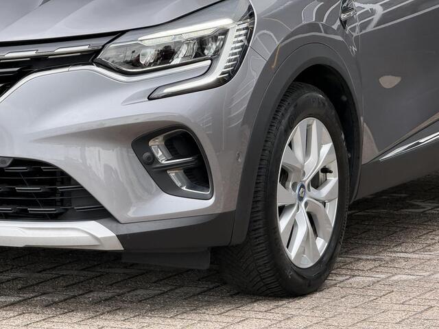 Renault CAPTUR 1.6 E-Tech Plug-in Hybrid 160 Intens | elektrisch glazen schuif-/kanteldak | 360 graden camera | Stoelverwarming | Park assist | Navigatie |