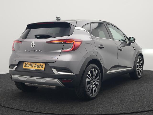 Renault CAPTUR 1.6 E-Tech Initiale Paris PHEV 160pk Dealer O.H | Adaptive Cruise | 360 Camera | Lederen Sportstoelen Verwarmd | Stuur Verwarmd | Blis | Keyless | Navigatie | DAB | 18"L.M | Plug In Hybrid |