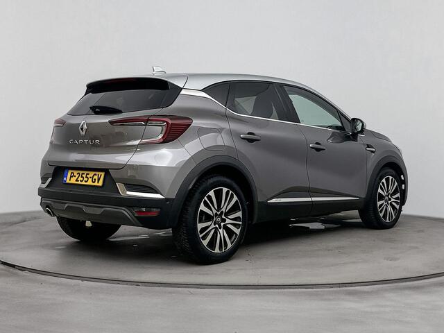 Renault CAPTUR 1.3 TCe 140Pk Initiale Paris | Navigatie | Apple Carplay/Android Auto | Achteruitrijcamera | Parkeersensoren Voor en Achter | Verwarmbare Voorstoelen | Dodehoek Detectie | Elektrisch Verstelbare Bestuurdersstoel | Bose Audioinstallatie |