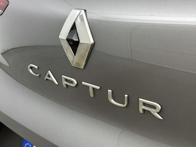Renault CAPTUR 1.3 TCe 140Pk Initiale Paris | Navigatie | Apple Carplay/Android Auto | Achteruitrijcamera | Parkeersensoren Voor en Achter | Verwarmbare Voorstoelen | Dodehoek Detectie | Elektrisch Verstelbare Bestuurdersstoel | Bose Audioinstallatie |