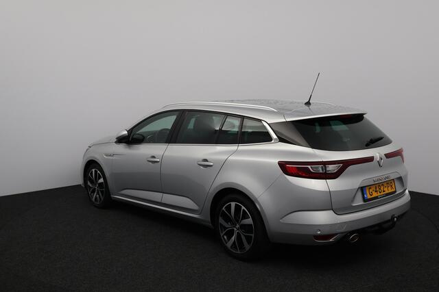 Renault MEGANE Estate 1.3 TCe Bose/ Automaat/ Trekhaak/ 17'' LMV/ Apple + Android/ Dode-Hoek DET./ Half-Leder/ Lane-Assist./ Camera/ Keyless/ PDC V+a/ Extra getint glas/ DAB+/ Dakrails.