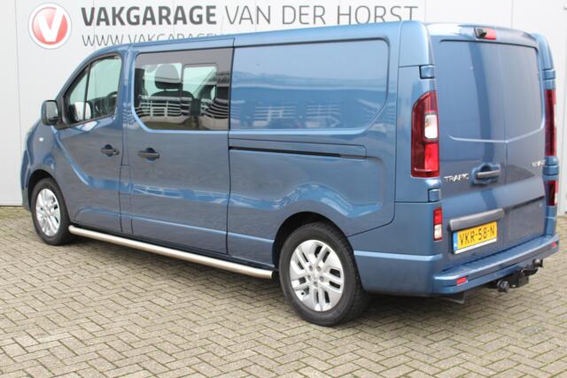 Renault TRAFIC 2.0-145pk dCi T29 L2H1 dubb. cabine Comfort. Erg nette Renault Trafic mèt dubbele cabine. Bijrijdersstoel, camera, LED verl., navigatie, tel. voorb., cruise control, airco, metallic lak, schuifdeur li+re, LM wielen, side bars, laadruimte betimmerd, trekha