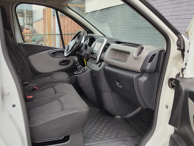 Renault TRAFIC 1.6 dCi 126PK T29 L2H1 3-Persoons Euro 6 Trekhaak Airco Navi Cruise Control Bluetooth Pdc Comfort Energy Betonplex vloer Wandbetimmering Schuifdeur Achterdeuren Origineel Nederlandse Auto
