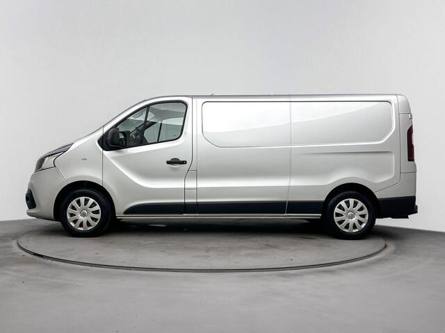 Renault TRAFIC 1.6 dCi 120 Pk T29 L2H1 Luxe | Navigatie | Airco | Cruise control | Parkeersensor achter | Zijschuifdeur Rechts | Trekhaak | Passagiersbank | Mistlampen Voor | Betimmering Laadruimte |